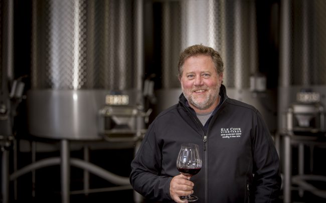 Winemaker Adam Campbell smiling at the camera