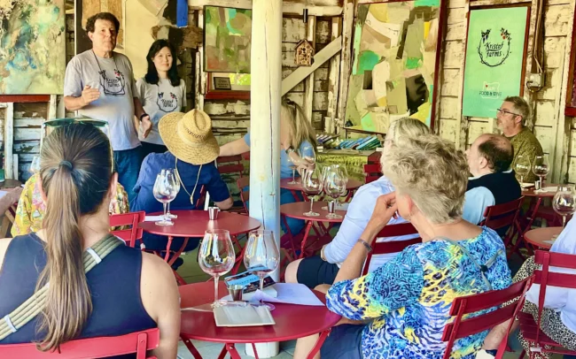 Guests enjoying a wine tasting at Kristof Farms